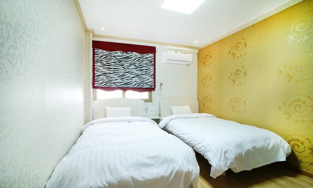Tamragio Residence Hotel Csedzsu Szoba fotó